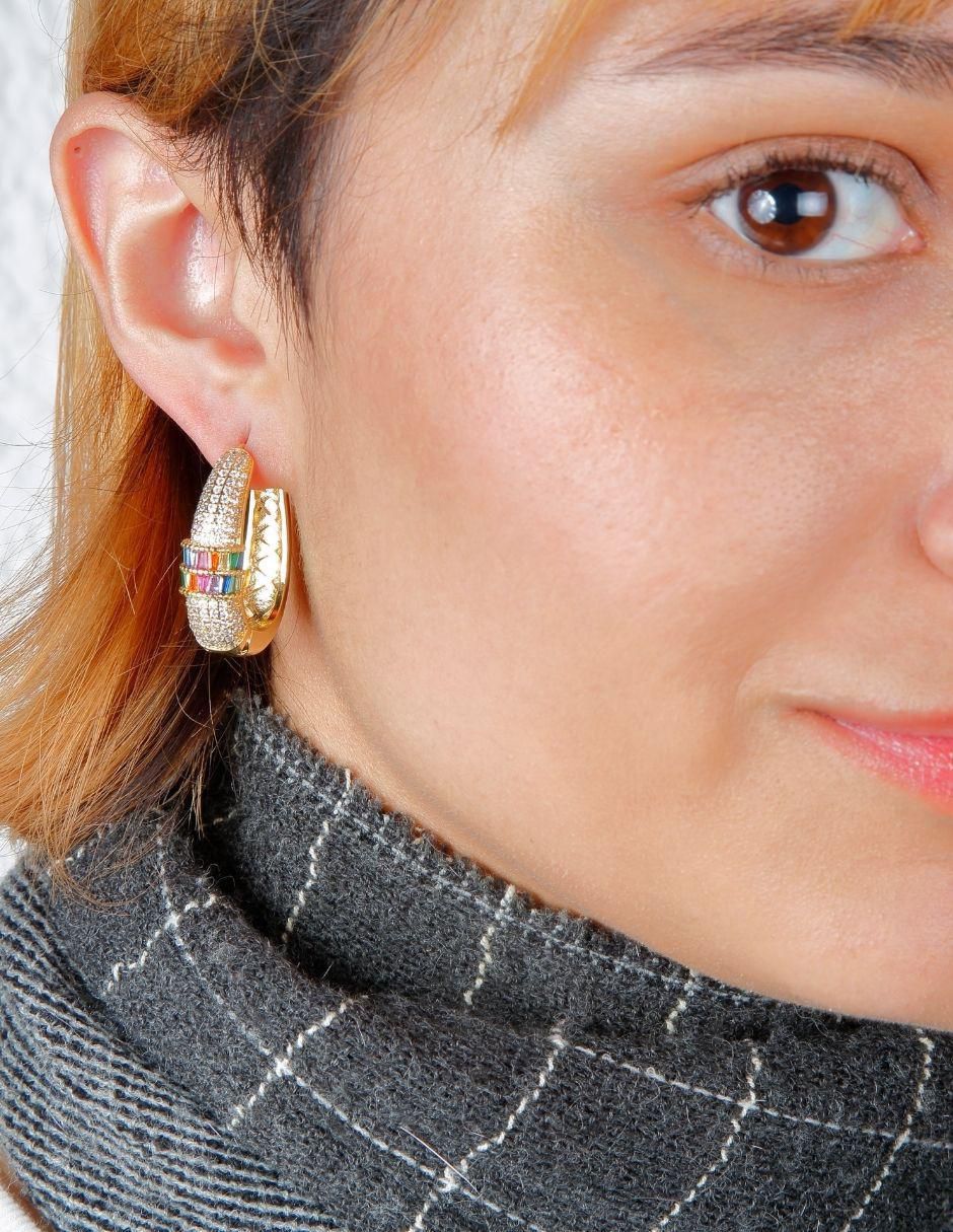 Aretes ovalados con acabado baño de oro 18 K 5